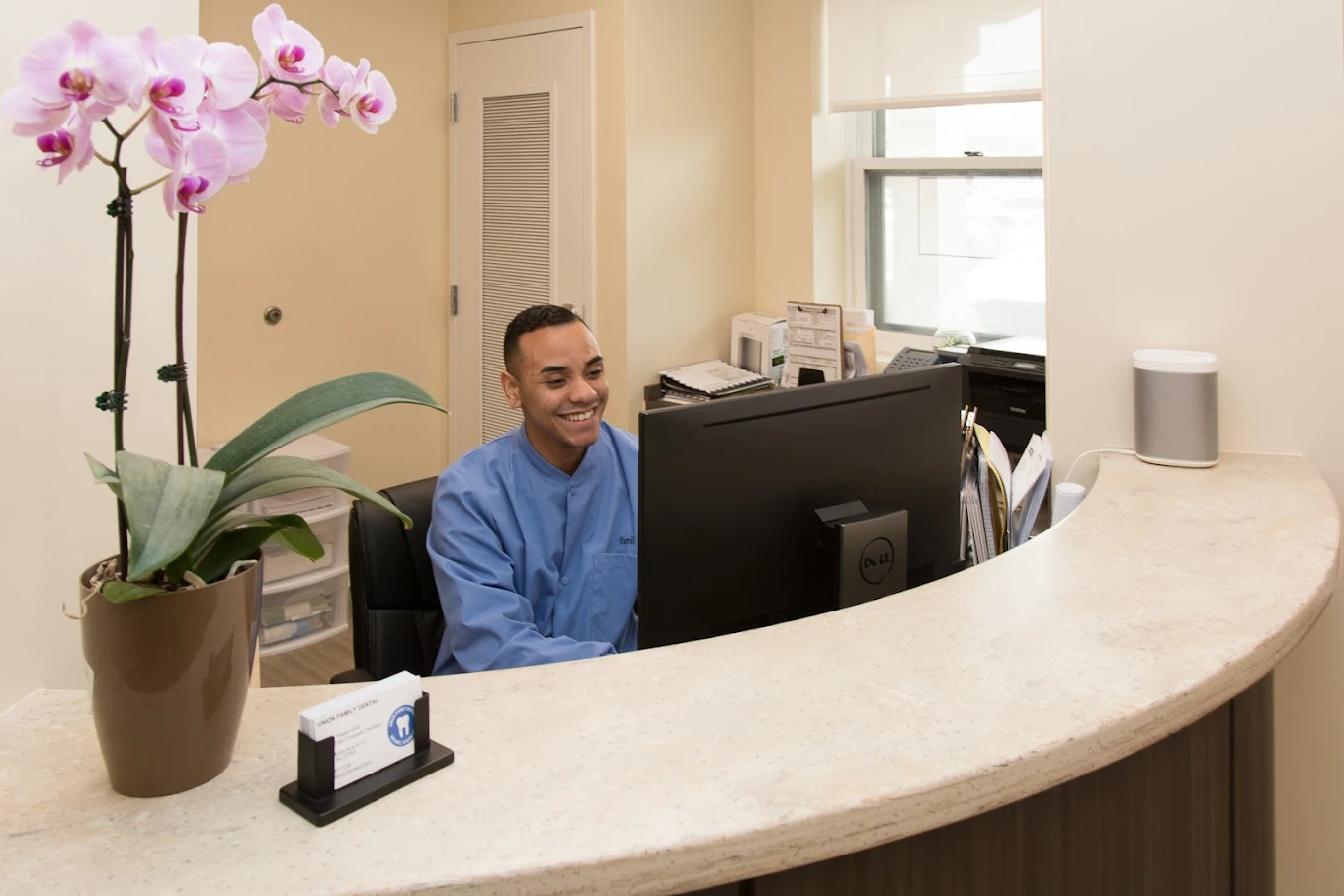 Dentist reviewing detailed dental X-rays